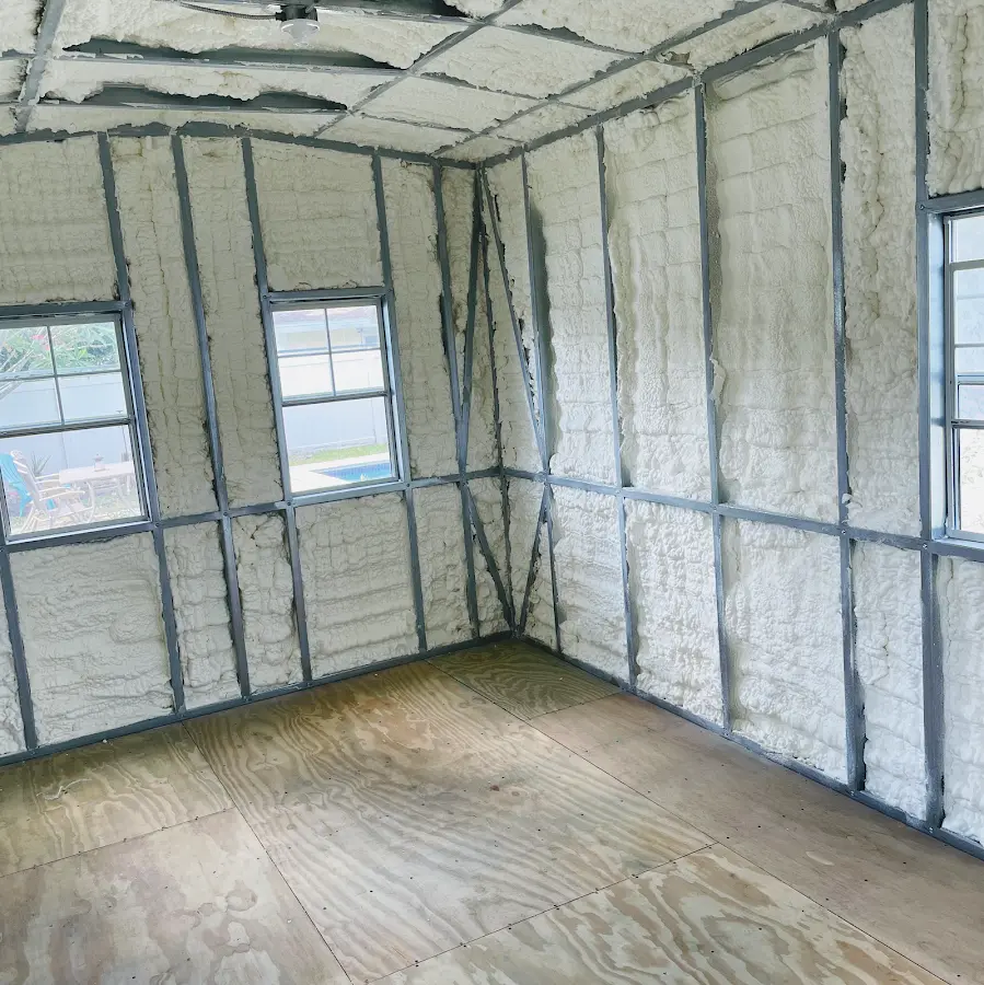 Closed-cell spray foam insulation applied to wall cavities in a residential project in Rehoboth